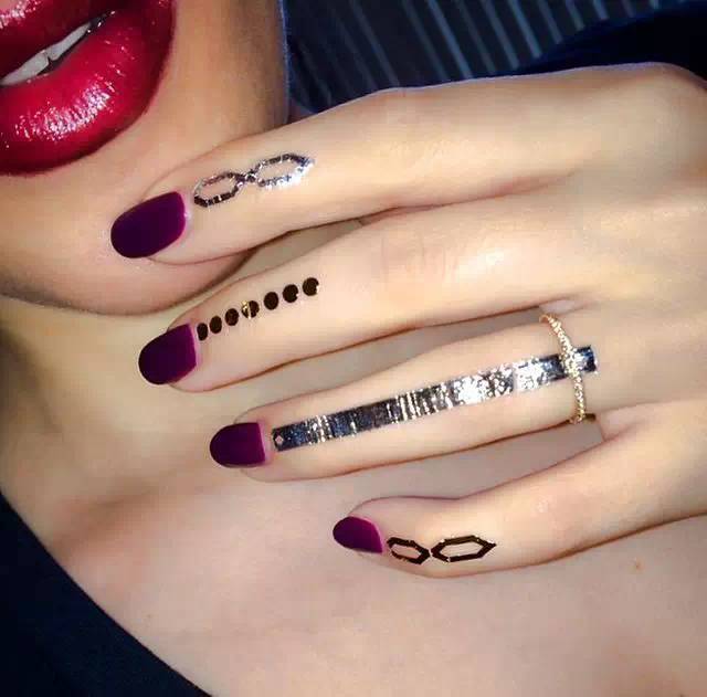 Fingertip manicures and tattoos are a better match